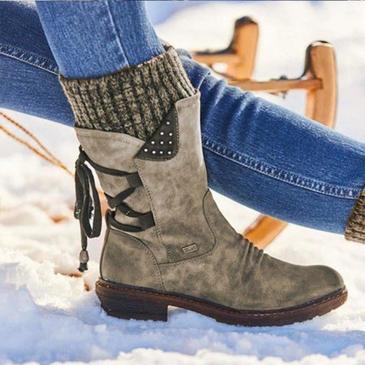 Botas de invierno con cordones en la espalda