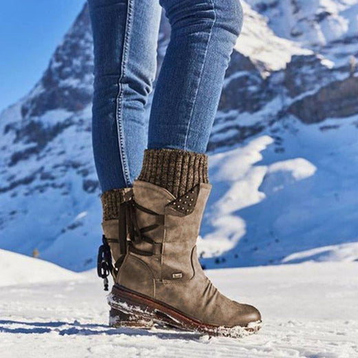 Botas de invierno con cordones en la espalda